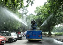Water sprinkler vehicles to combat air and dust pollution in city