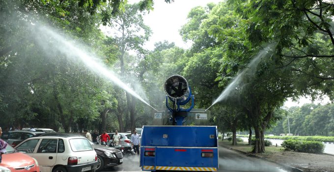 Water sprinkler vehicles to combat air and dust pollution in city