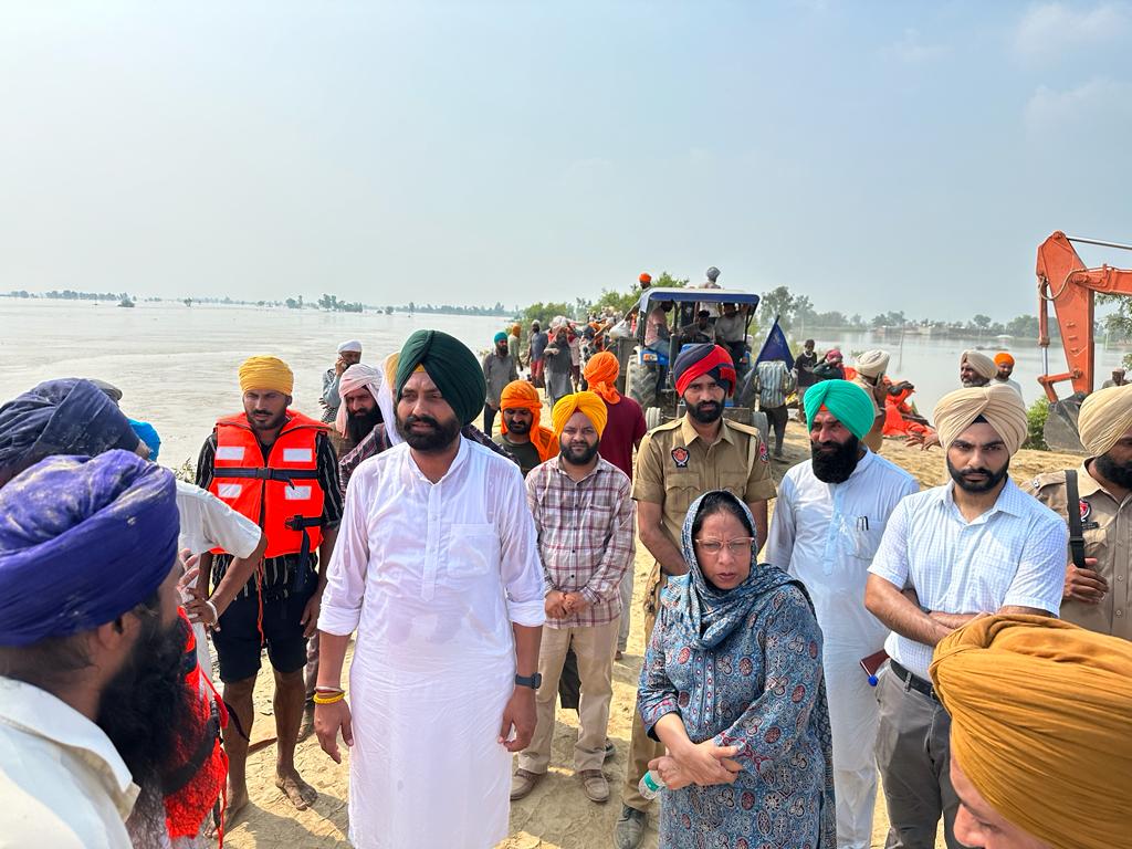 Cabinet Minister Laljit Singh Bhullar takes stock of works being carried out on a war footing to fill the breach in Dhussi bundh